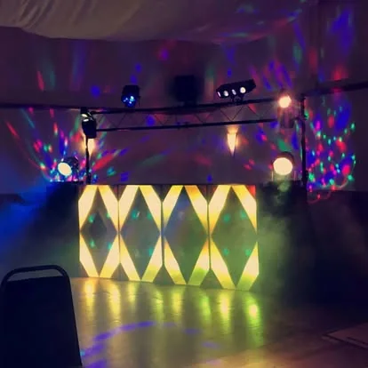 Large old school retro disco setup with illuminated light boxes